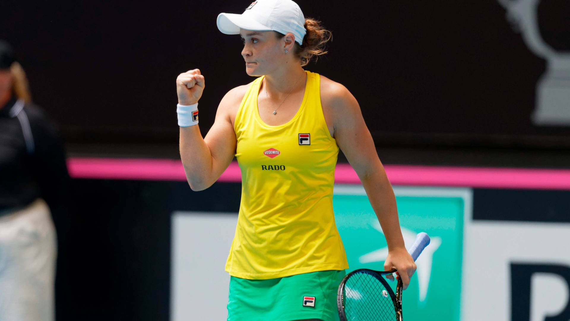 Ashleigh Barty Wearing Yellow Background