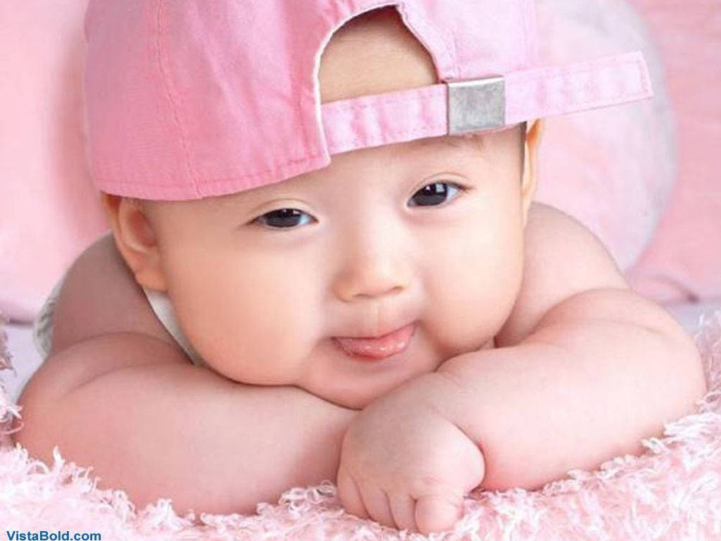 Asian Baby Wearing Pink Cap