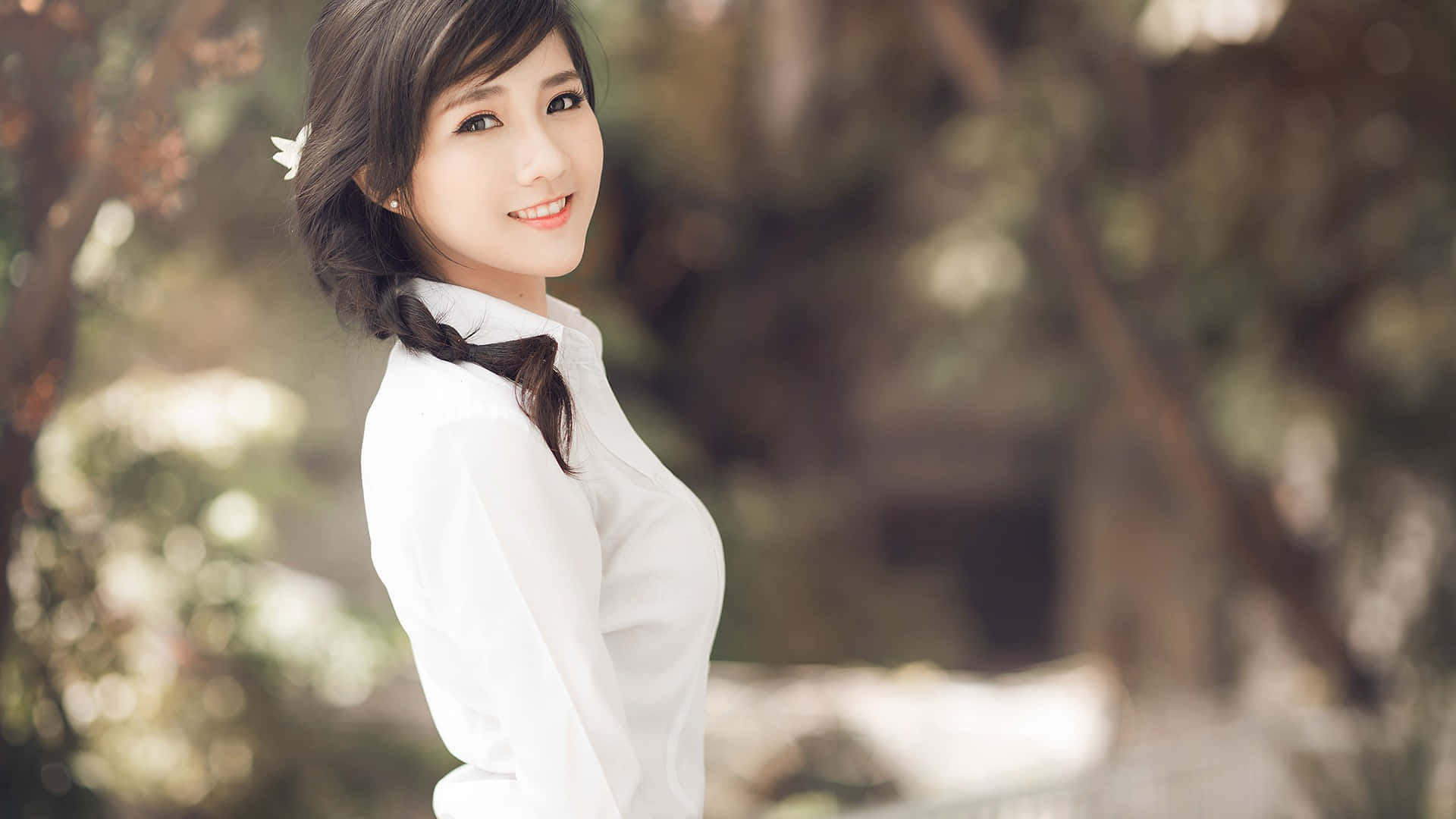 Asian Girl In White Shirt Posing For A Photo Background