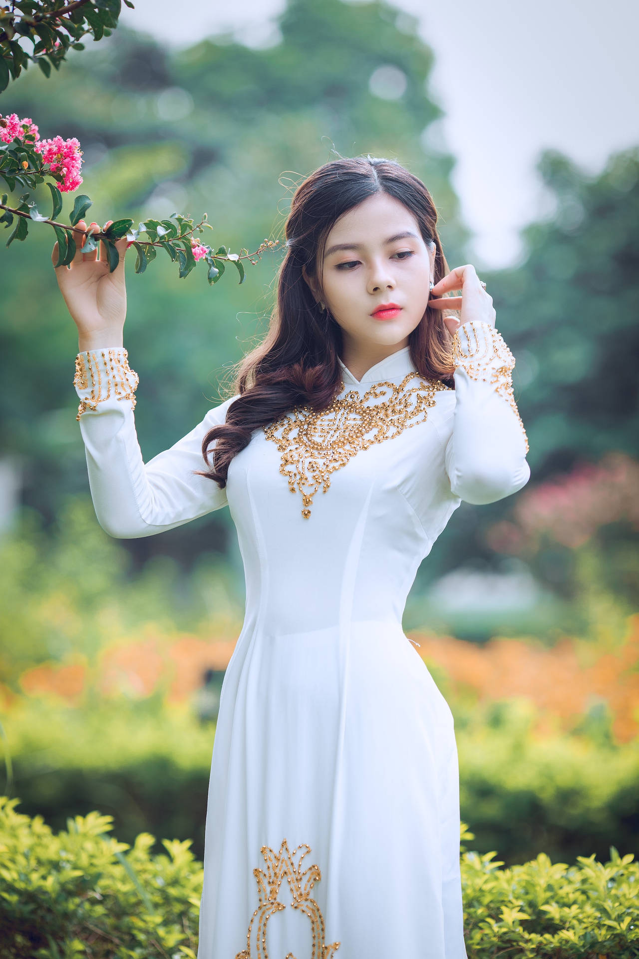 Asian Woman In Stunning White Dress