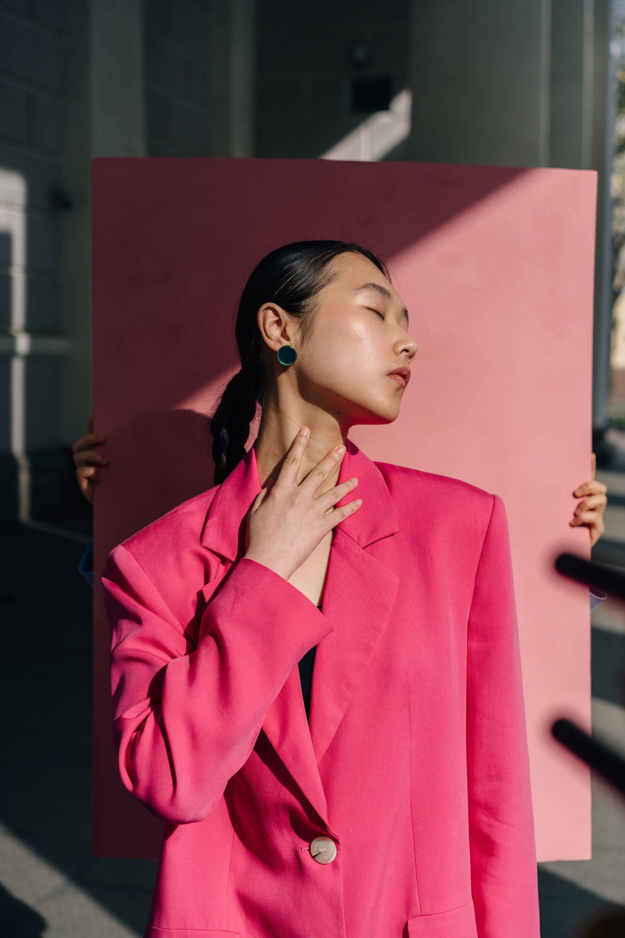 Asian Woman In Stylish Red Suit Background