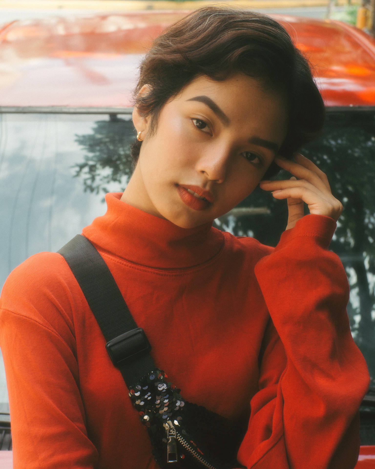 Asian Woman In Stylish Red Turtleneck Background
