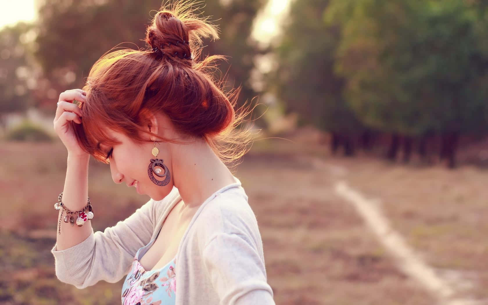 Asian Woman Profile With Messy Bun Background