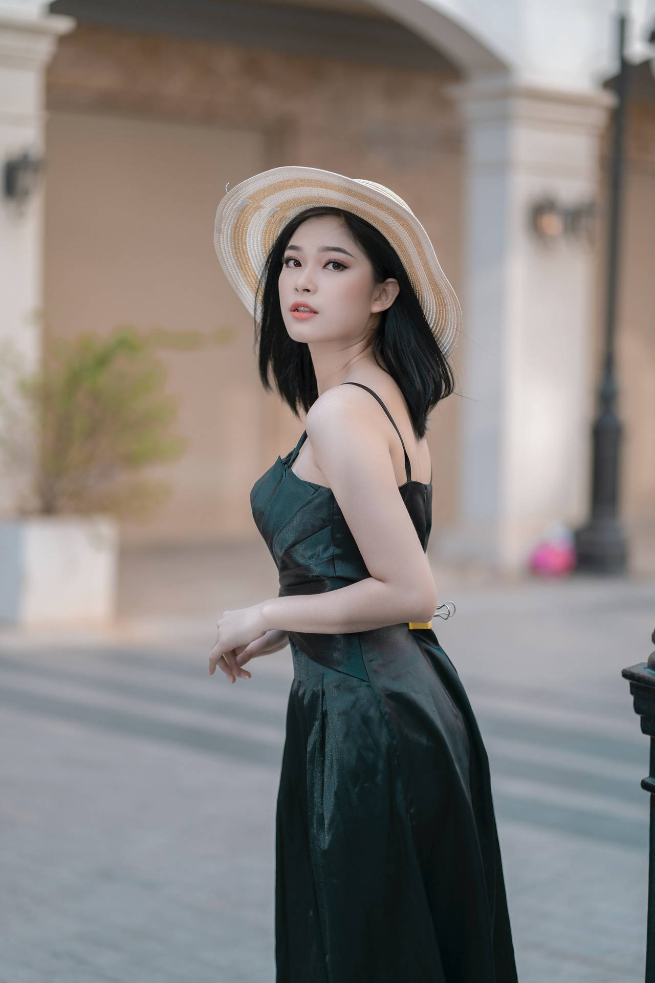 Asian Woman Wearing Elegant Green Dress Background