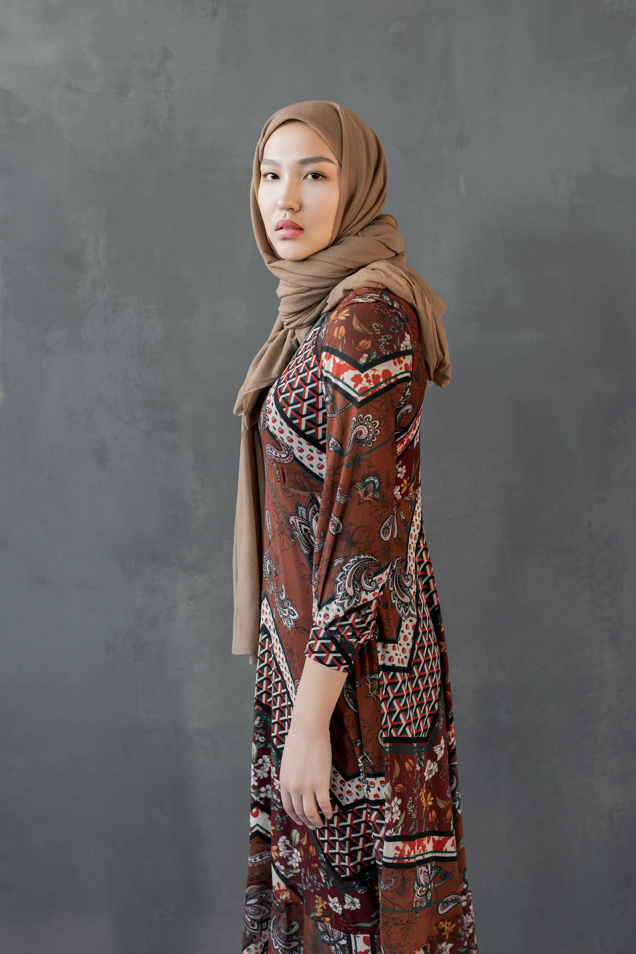 Asian Woman Wearing Stylish Brown Hijab Background