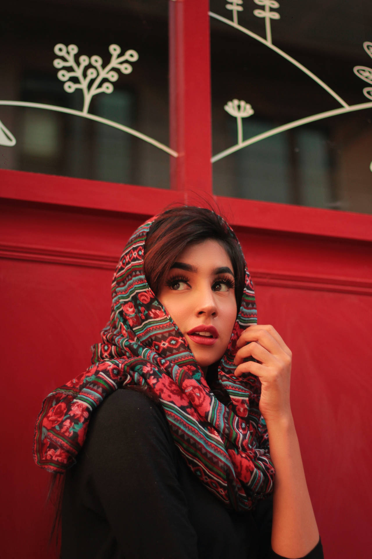 Asian Woman With A Floral Scarf Background