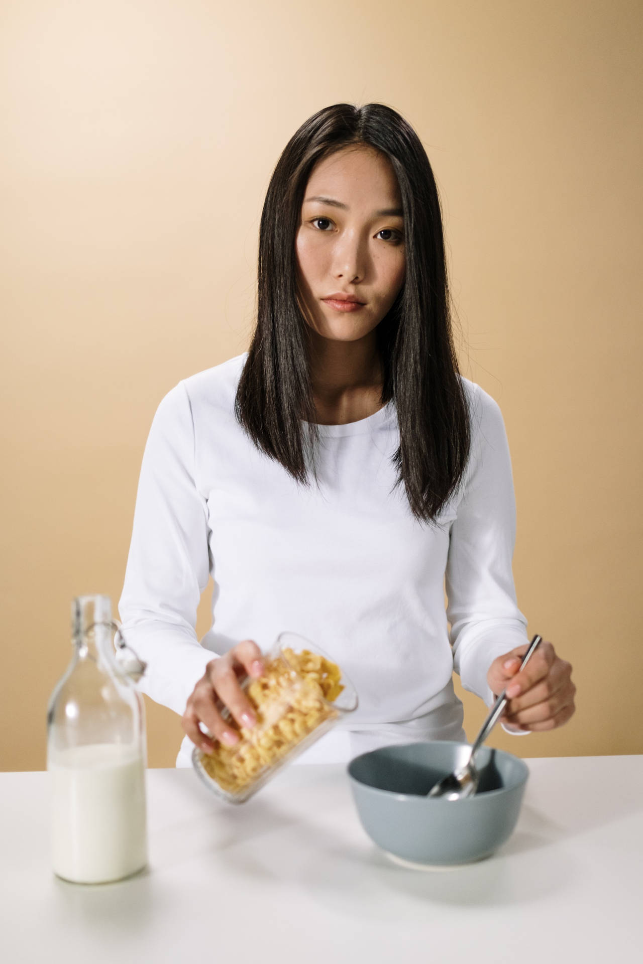 Asian Woman With Milk And Cereal Background