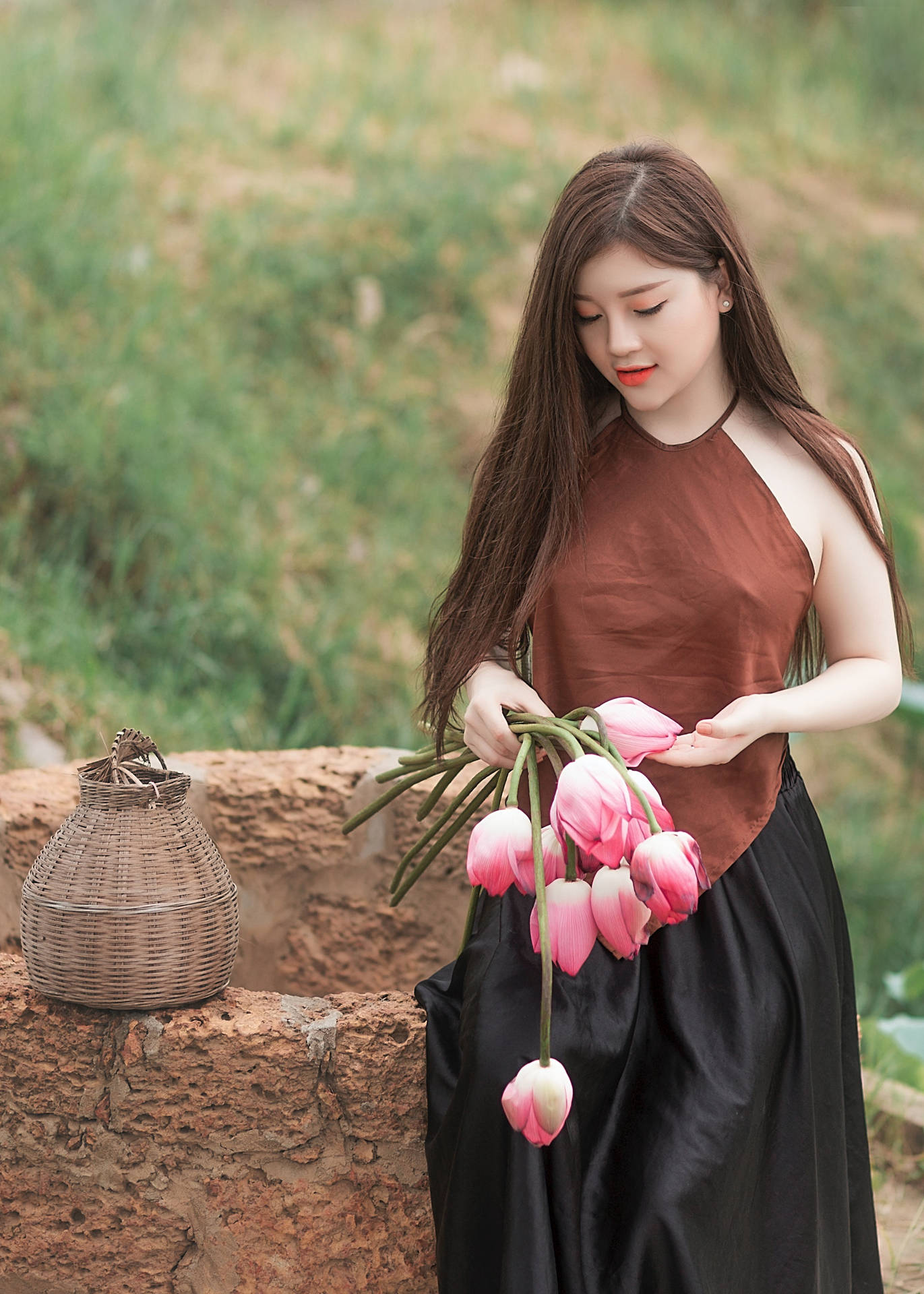 Asian Woman With Pink Tulips