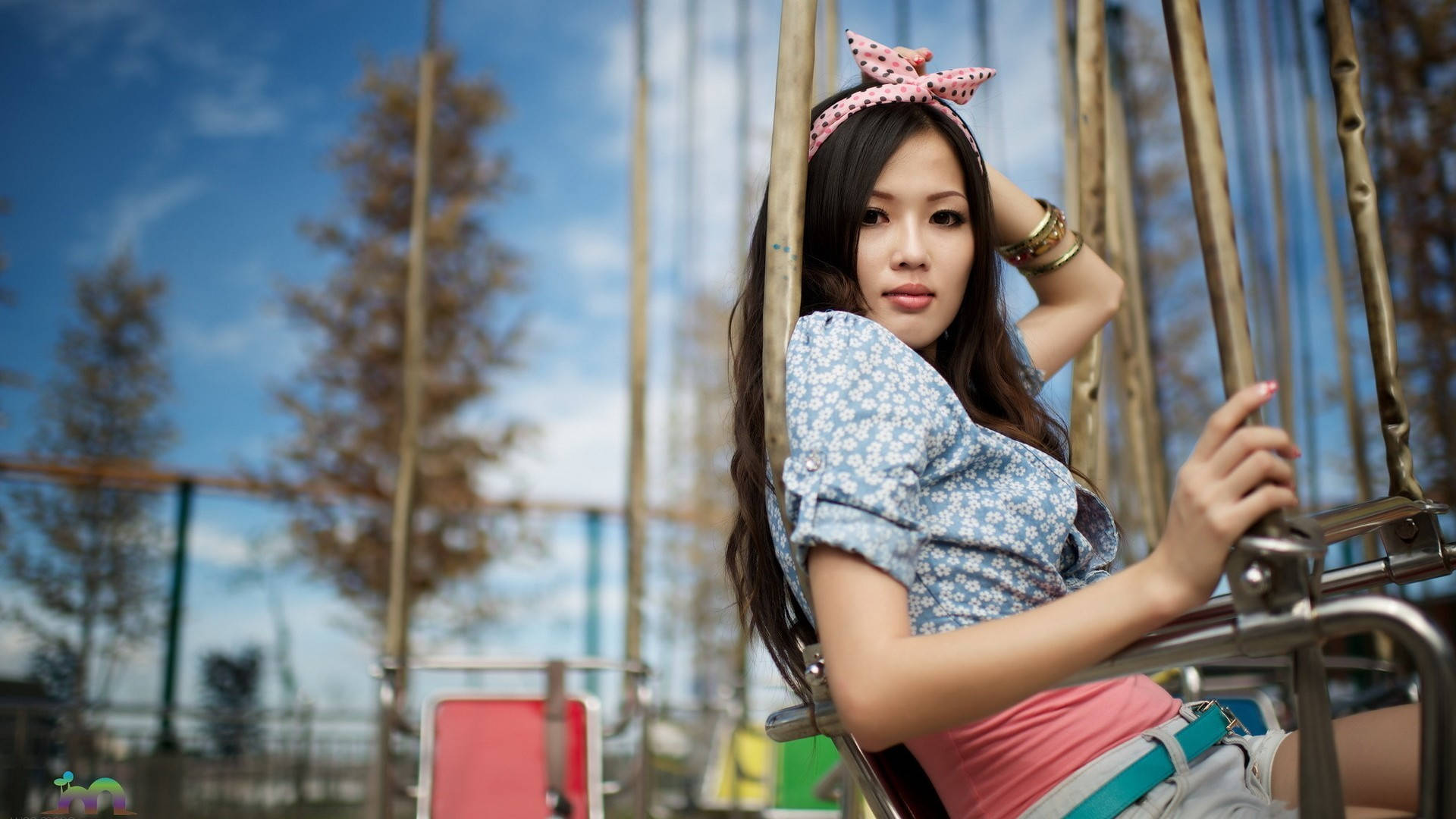 Asian Women In The Theme Park Background