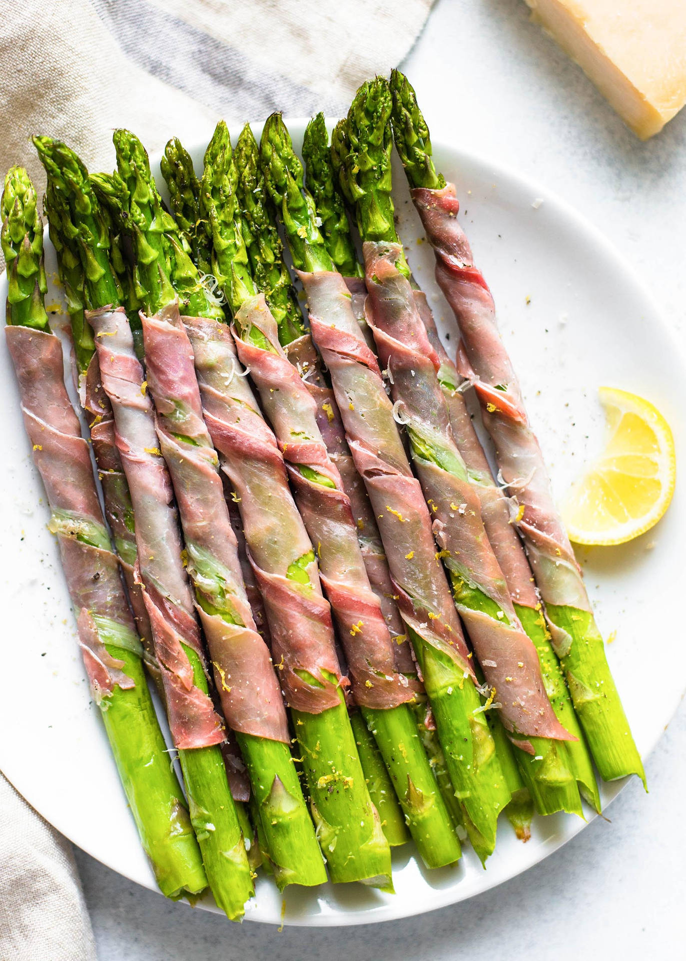 Asparagus Prosciutto Wrap With Lemon Background