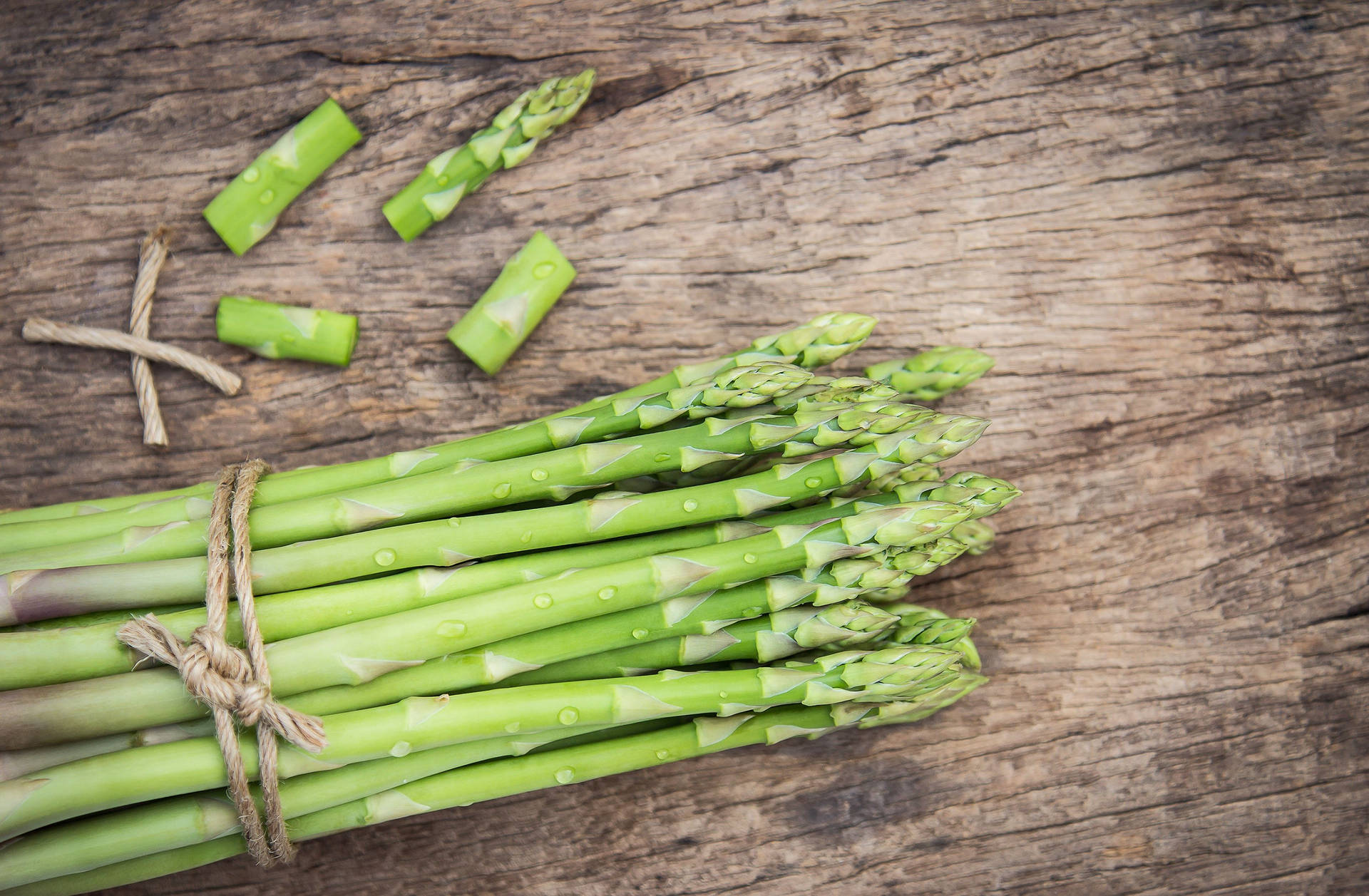 Asparagus Tied With A Brown Rope Background