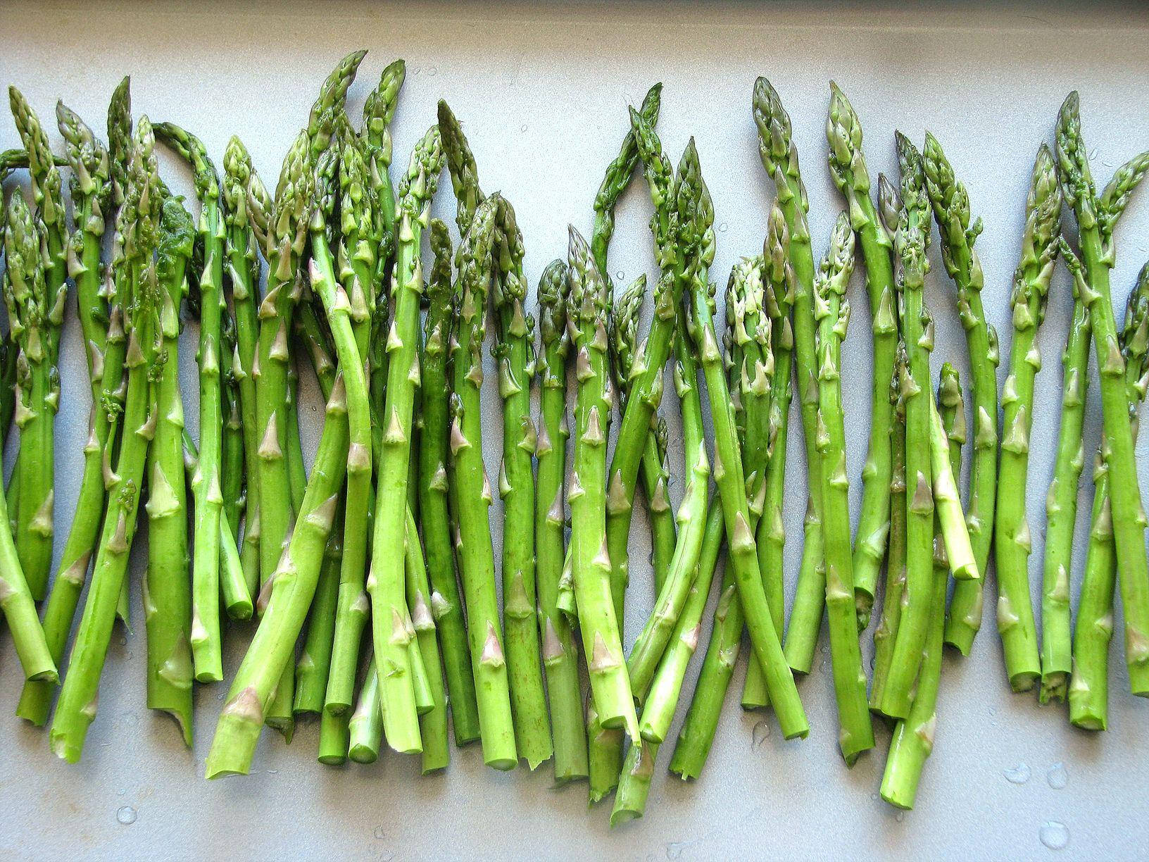 Asparagus With Pointy Crown Leaves Background