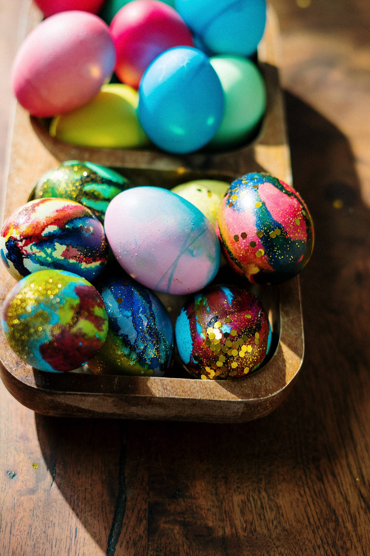 Assorted Color Happy Easter Eggs With Glitters Background