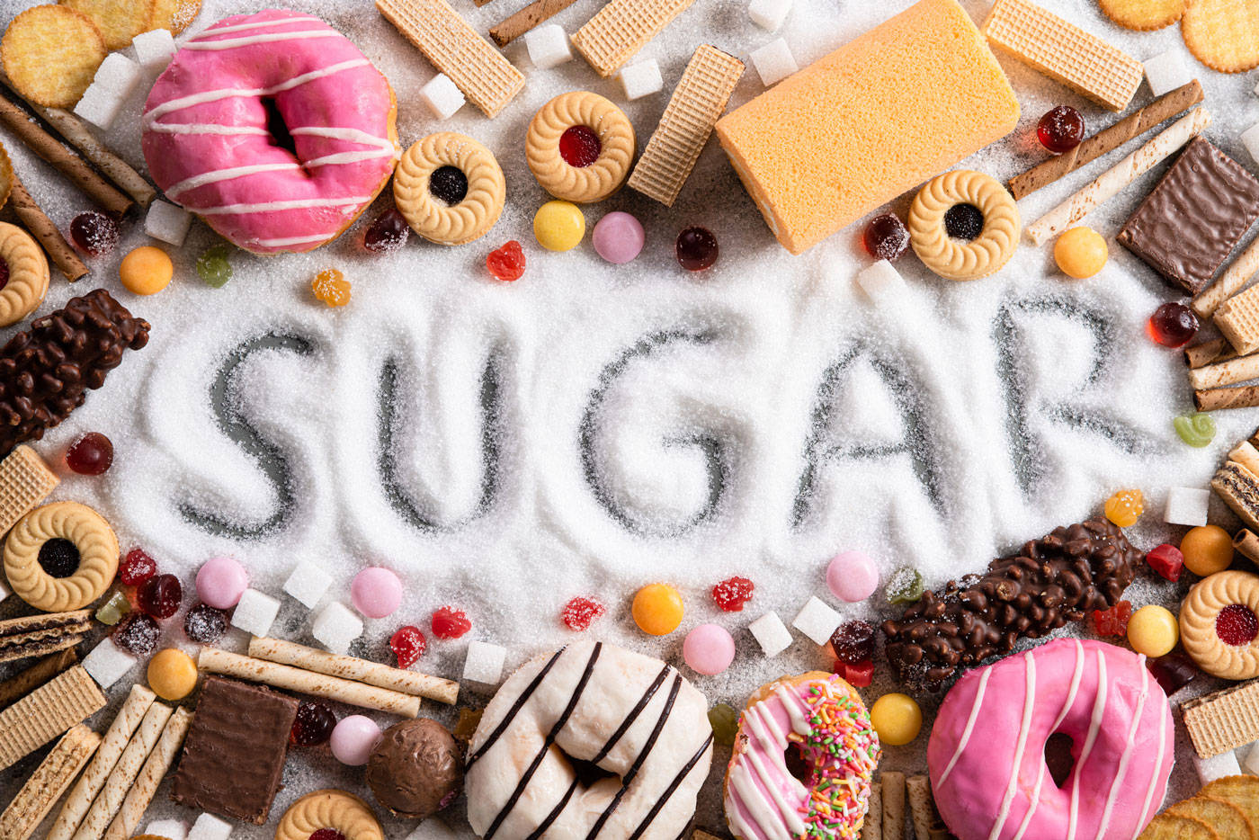 Assorted High-sugar Foods On Display Background