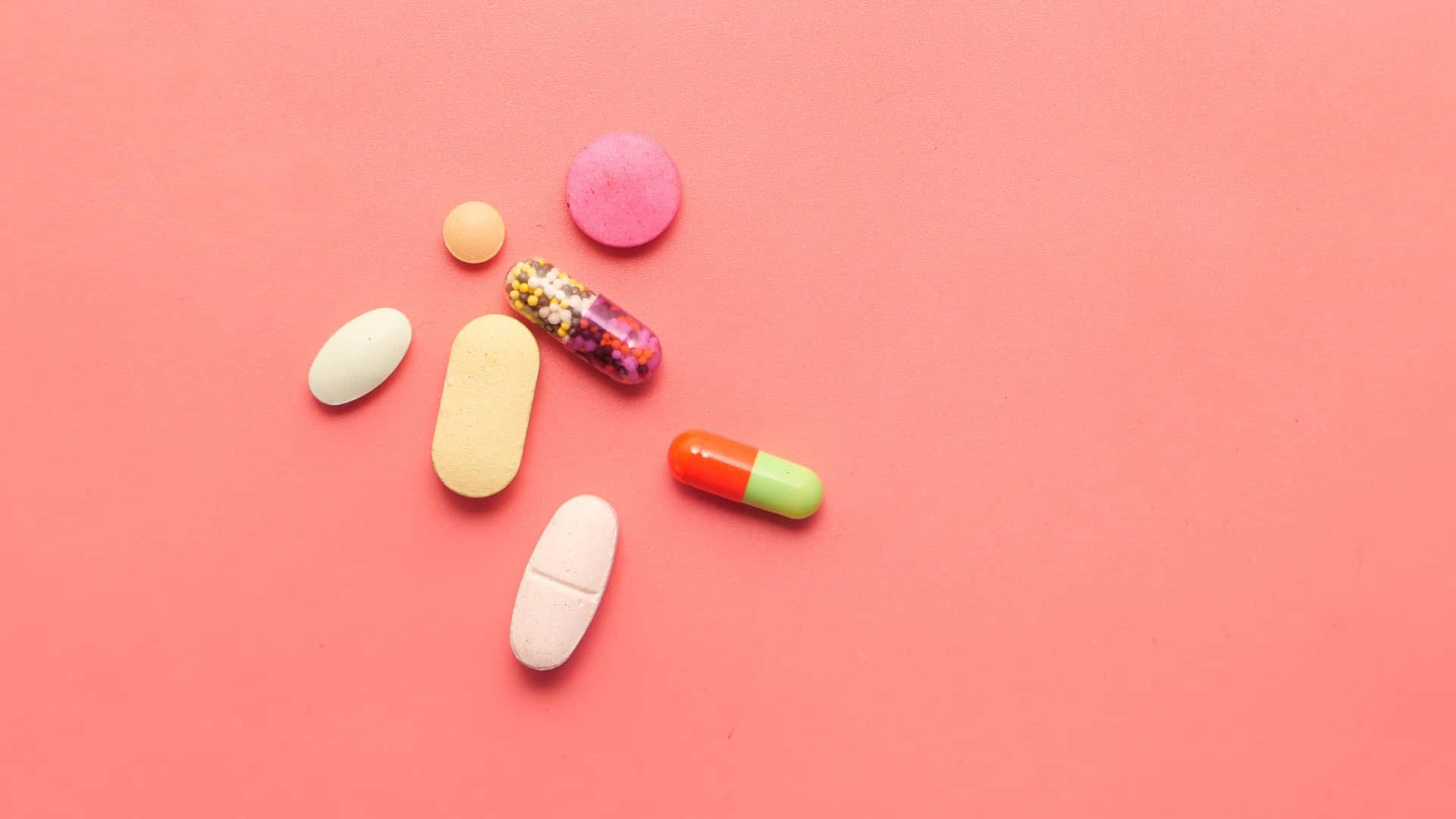 Assorted Medications Pink Background Background