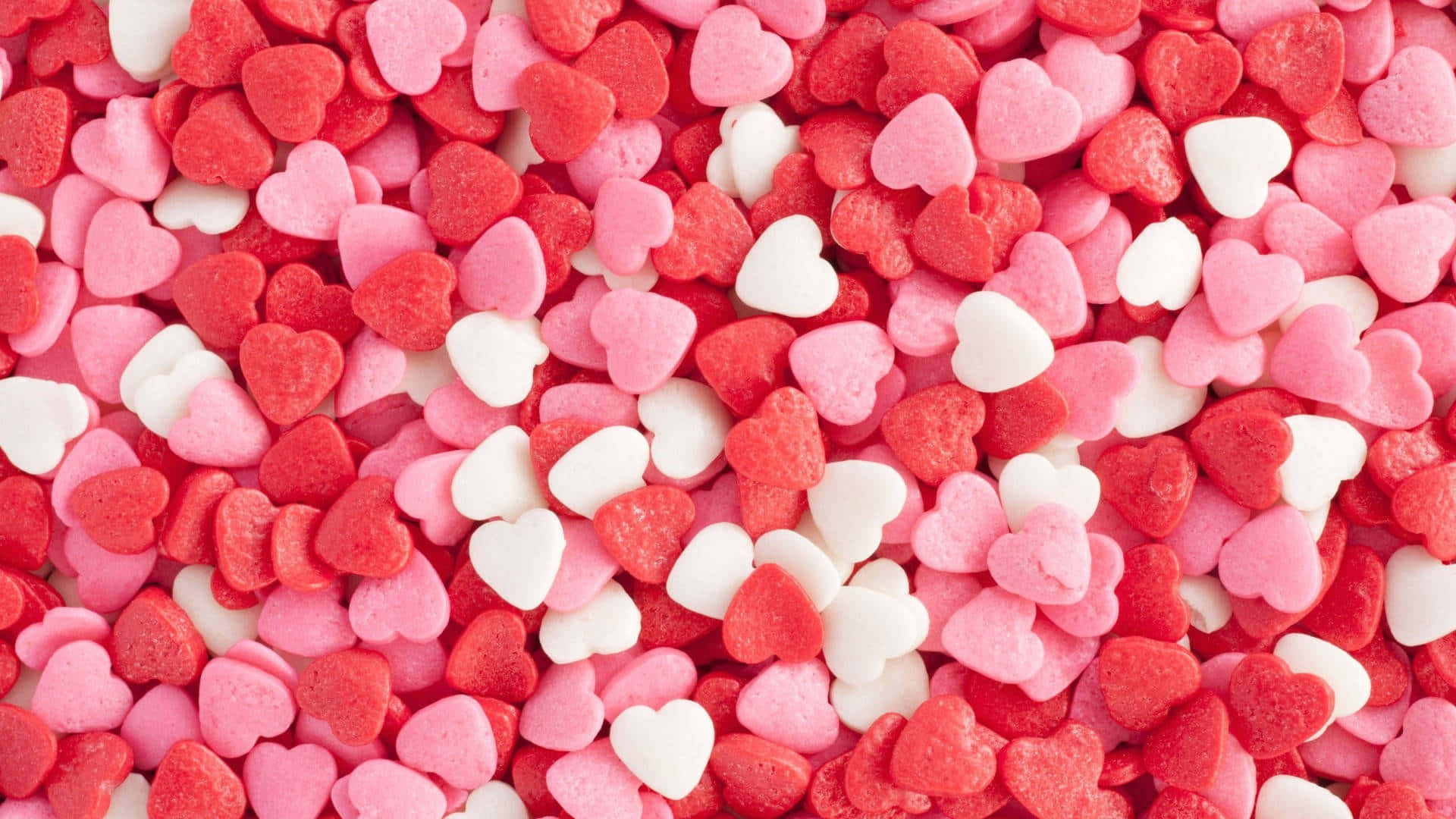 Assorted Pink Heart Candies Background Background