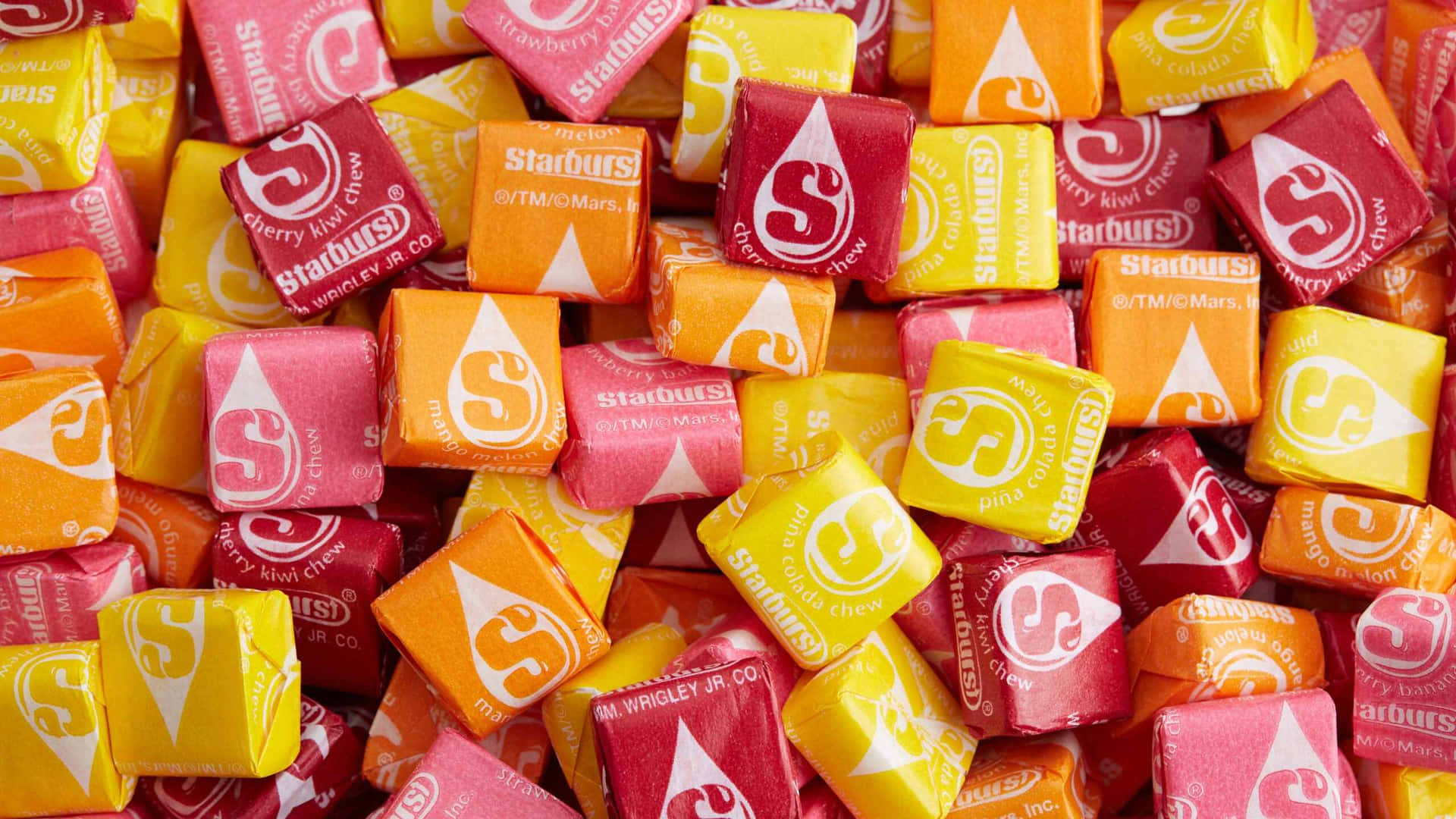 Assorted Starburst Candies Background