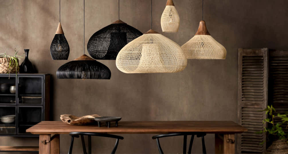 Assorted Woven Pendant Lights Over Table