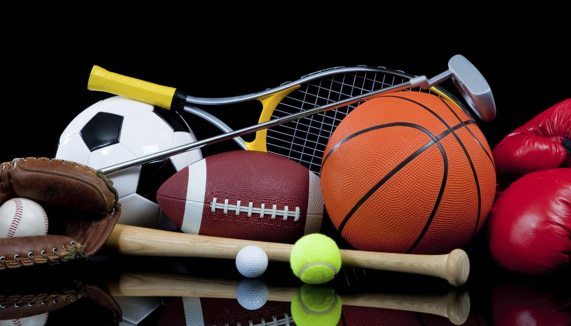 Assortment Of Balls And Sport Equipment Background