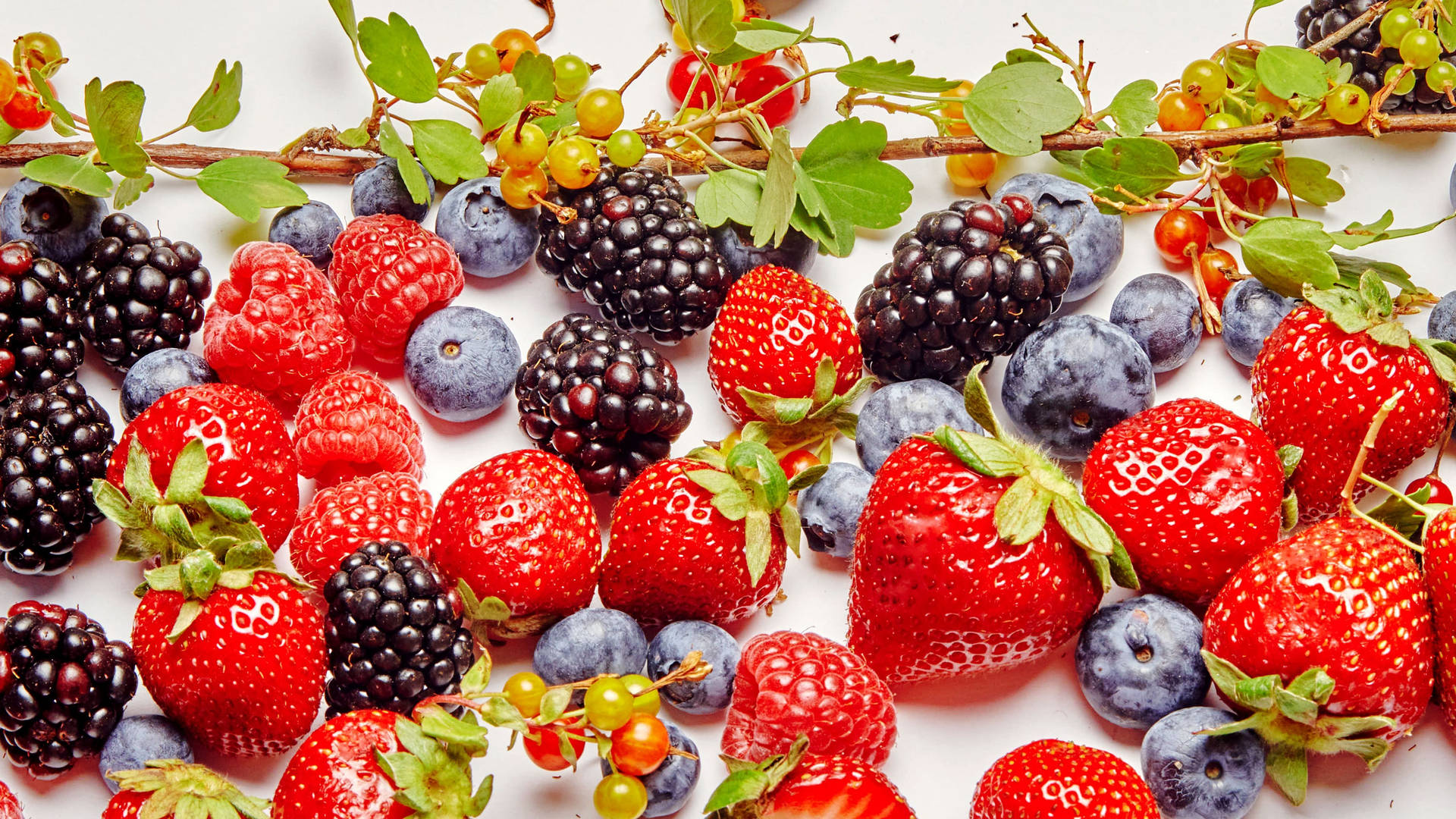 Assortment Of Vibrant, Fresh Boysenberries Background