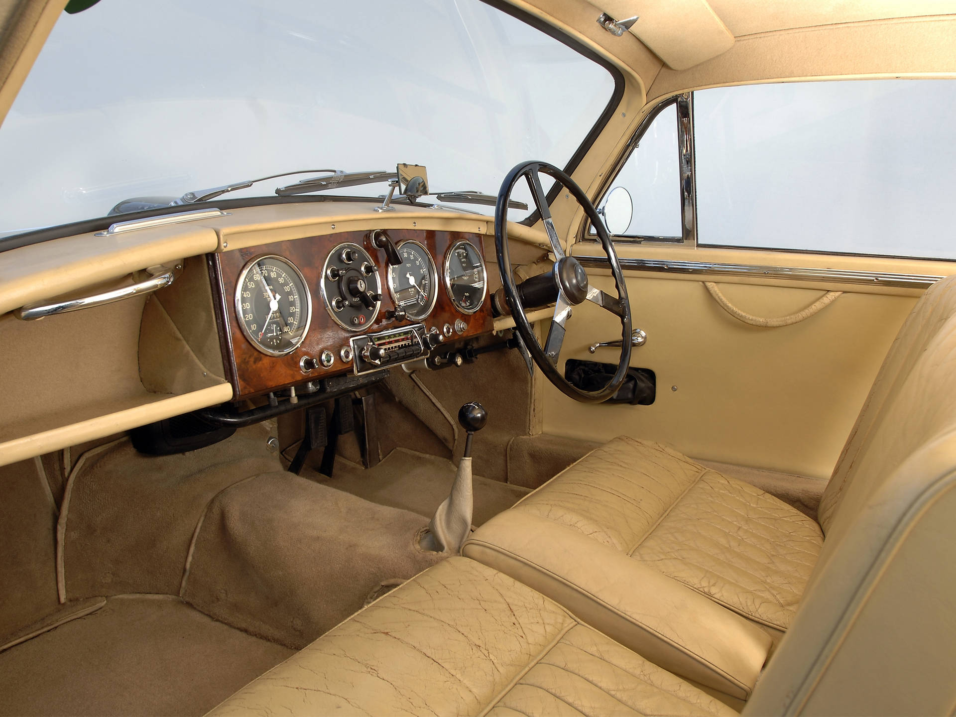 Aston Martin 1950 Beige Interior Background