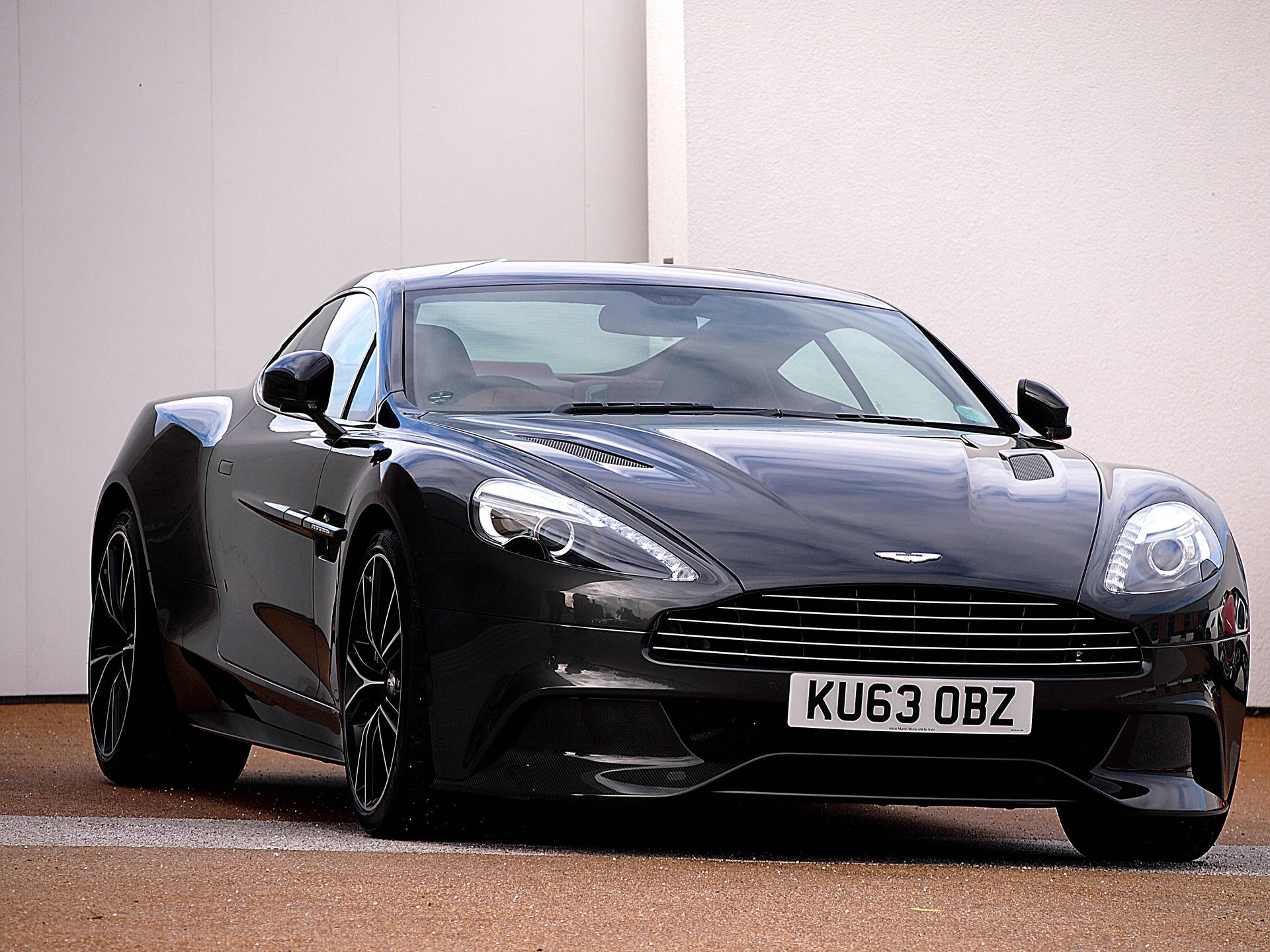 Aston Martin Vanquish Black Carbon Background