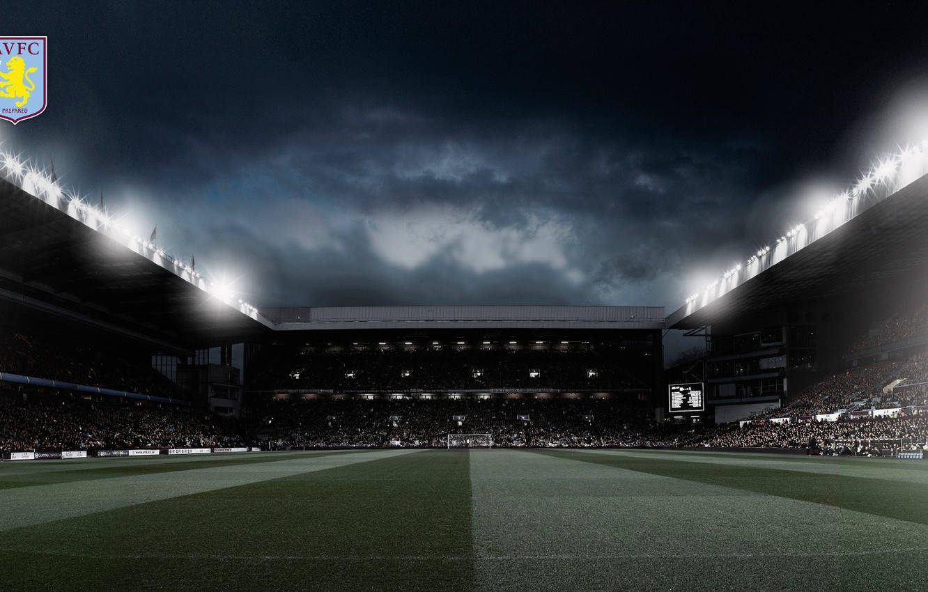 Aston Villa Fc On Home Ground Under A Vibrant Sky Background