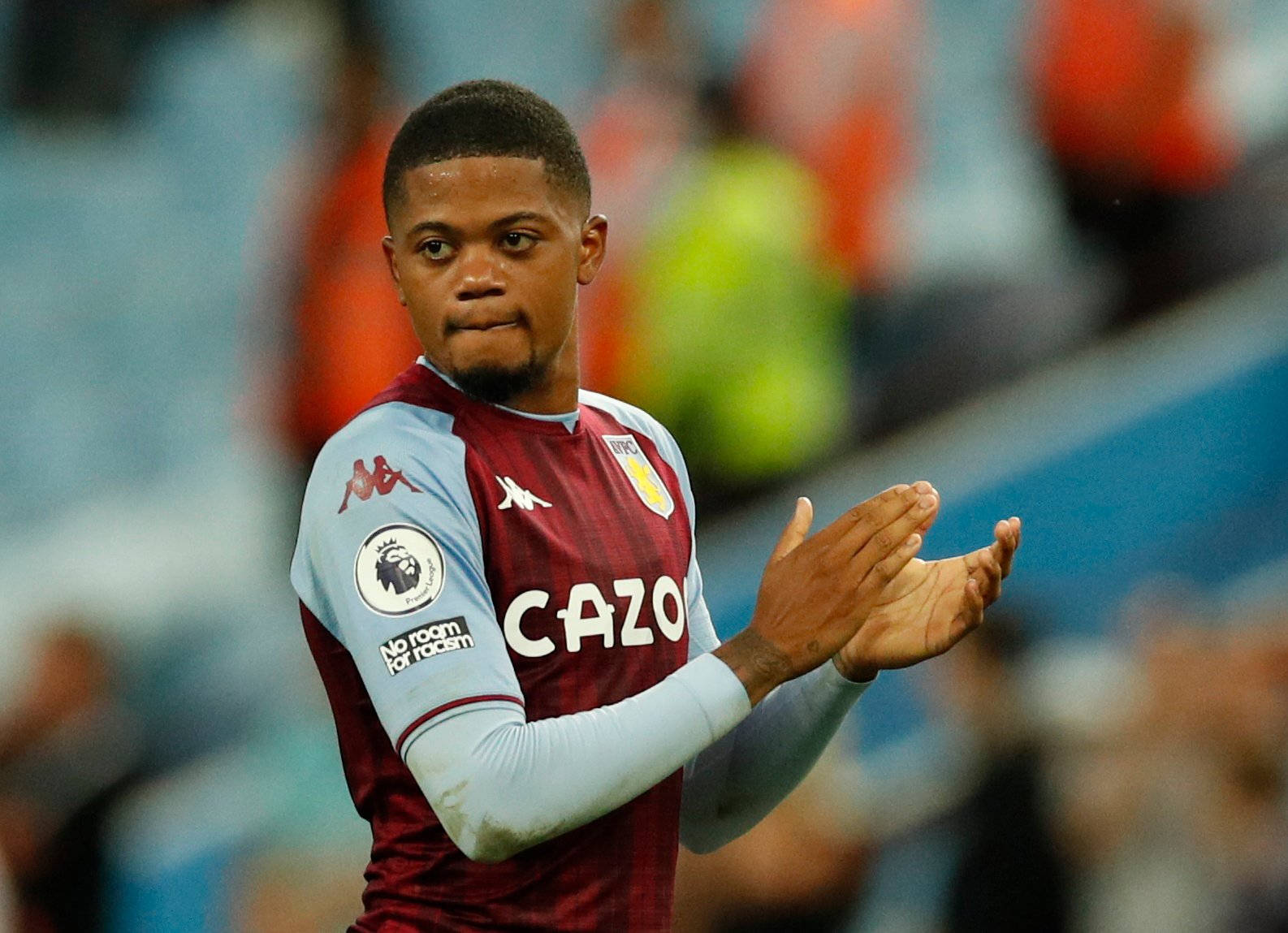 Aston Villa's Leon Bailey Applauding Fans During A Game Background