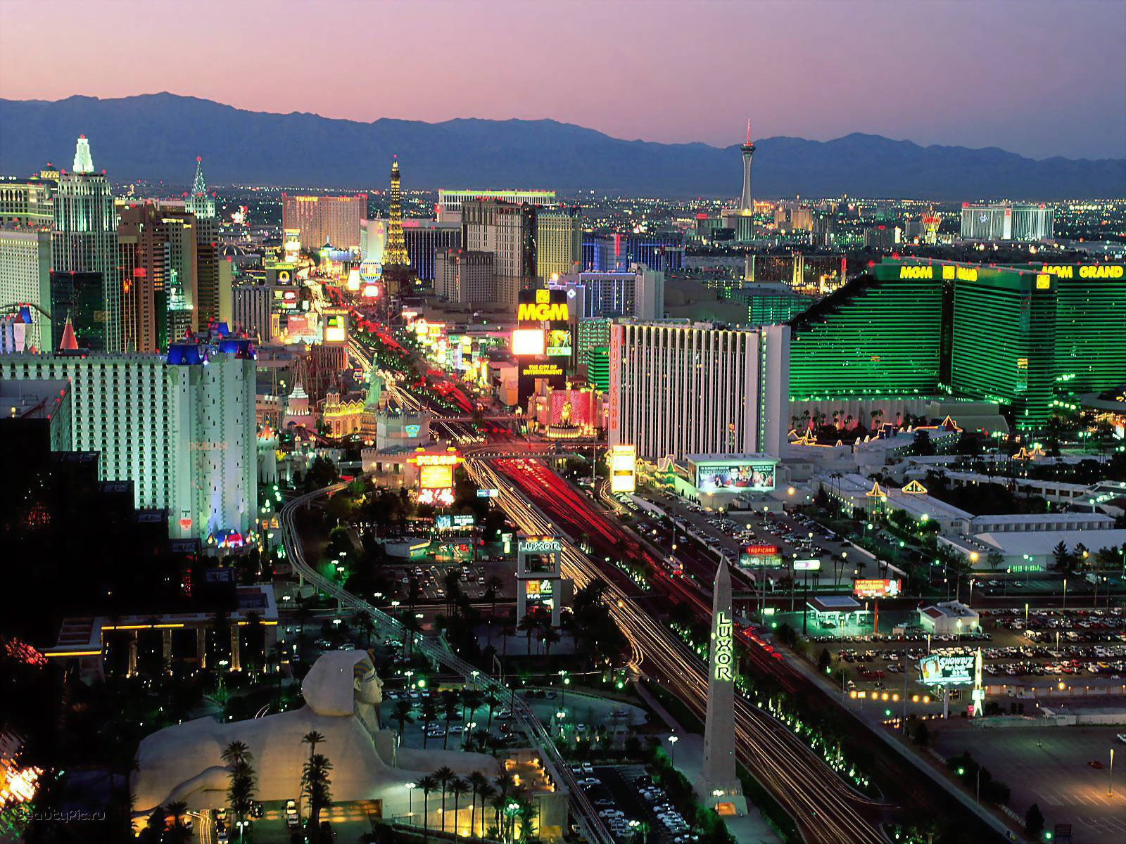 Astonishing Panoramic View Of Glittering Las Vegas Skyline At Night Background