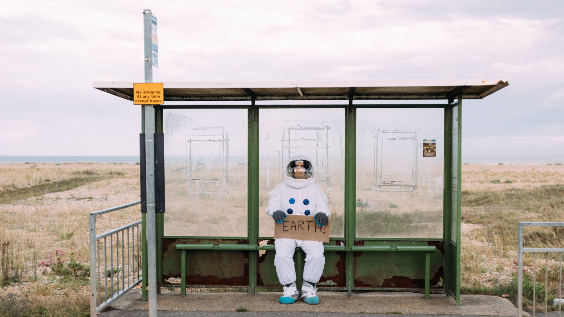 Astronaut At Bus Stop