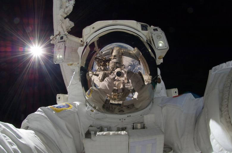 Astronaut In Space Taking A Selfie Background