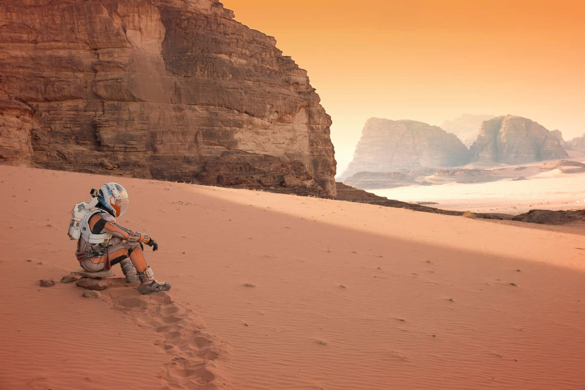 Astronaut Standing In Vast Mars Landscape Background