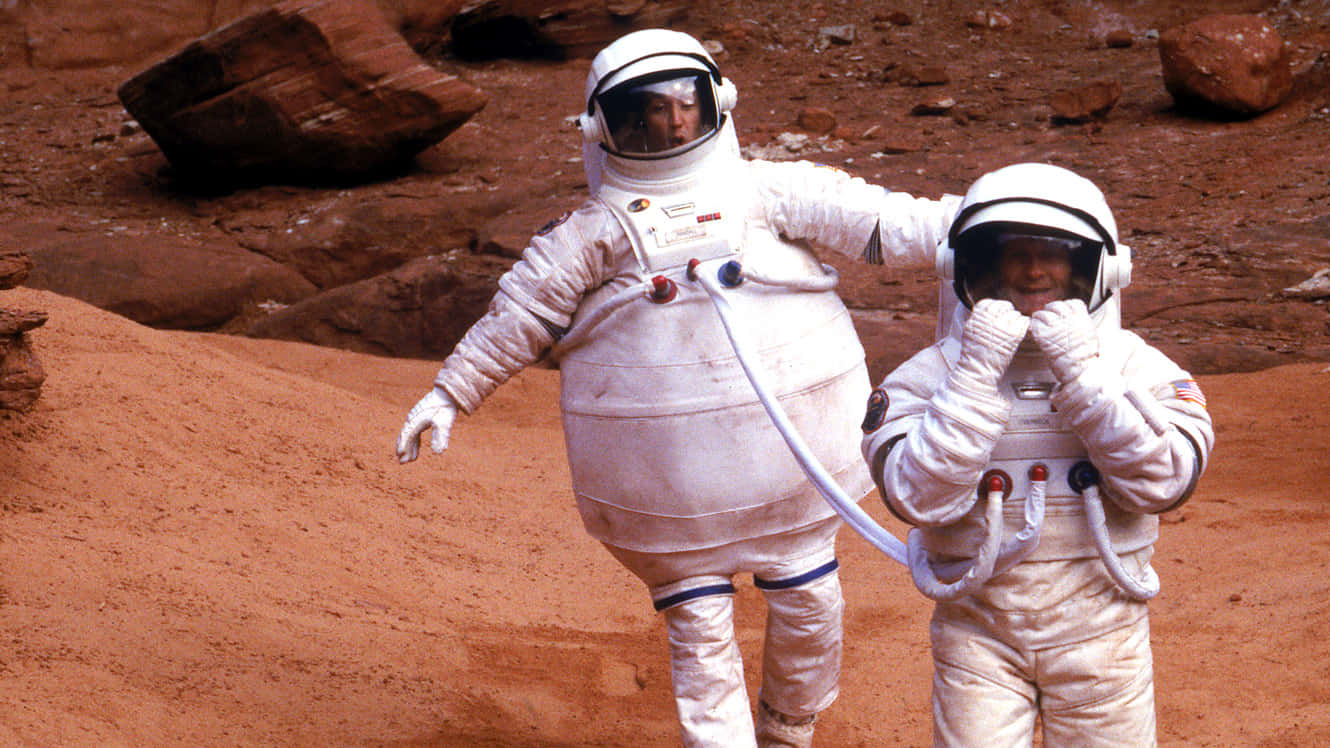 Astronauts_on_ Martian_ Terrain_ Simulation Background