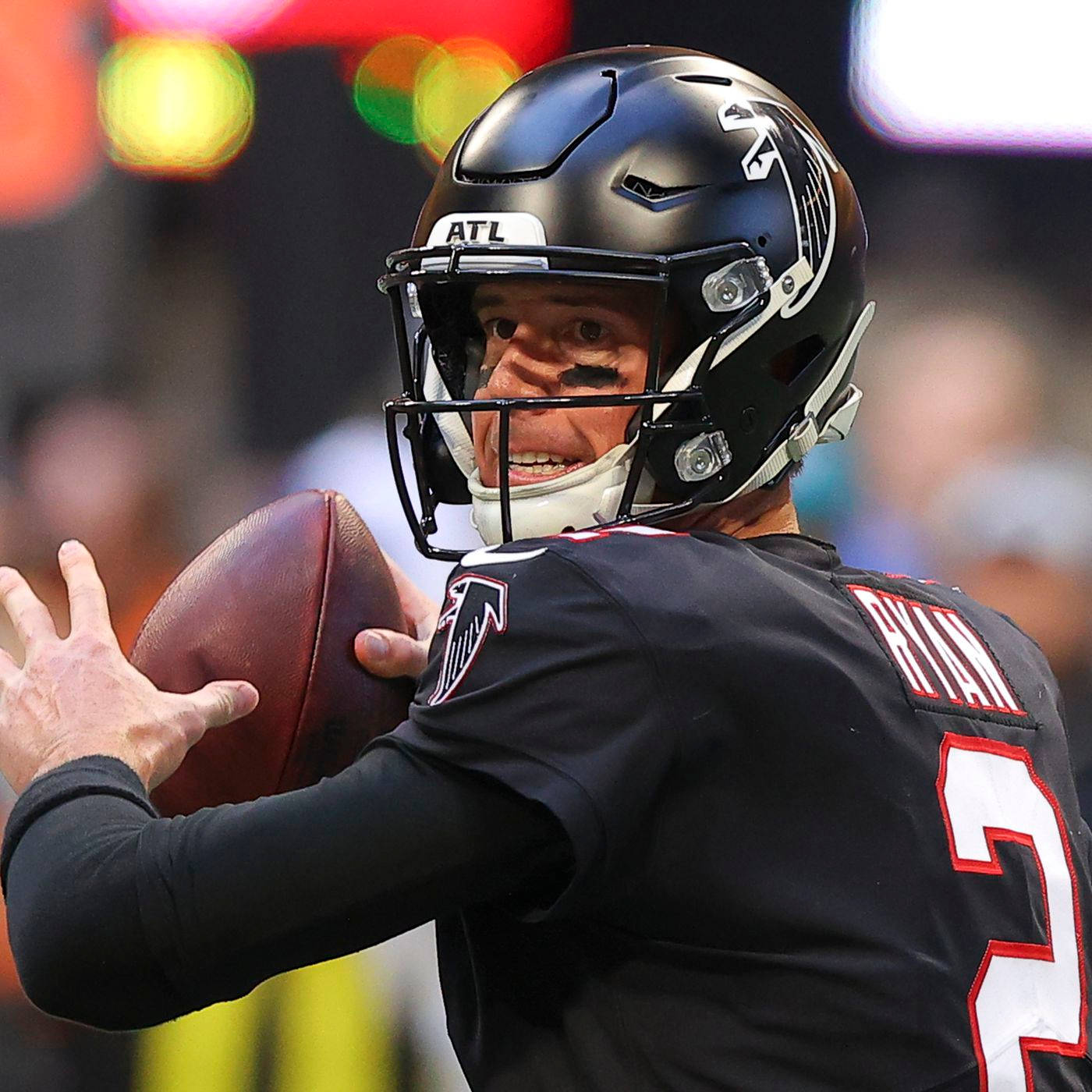 Atlanta Falcons Matt Ryan Throwing A Ball Background