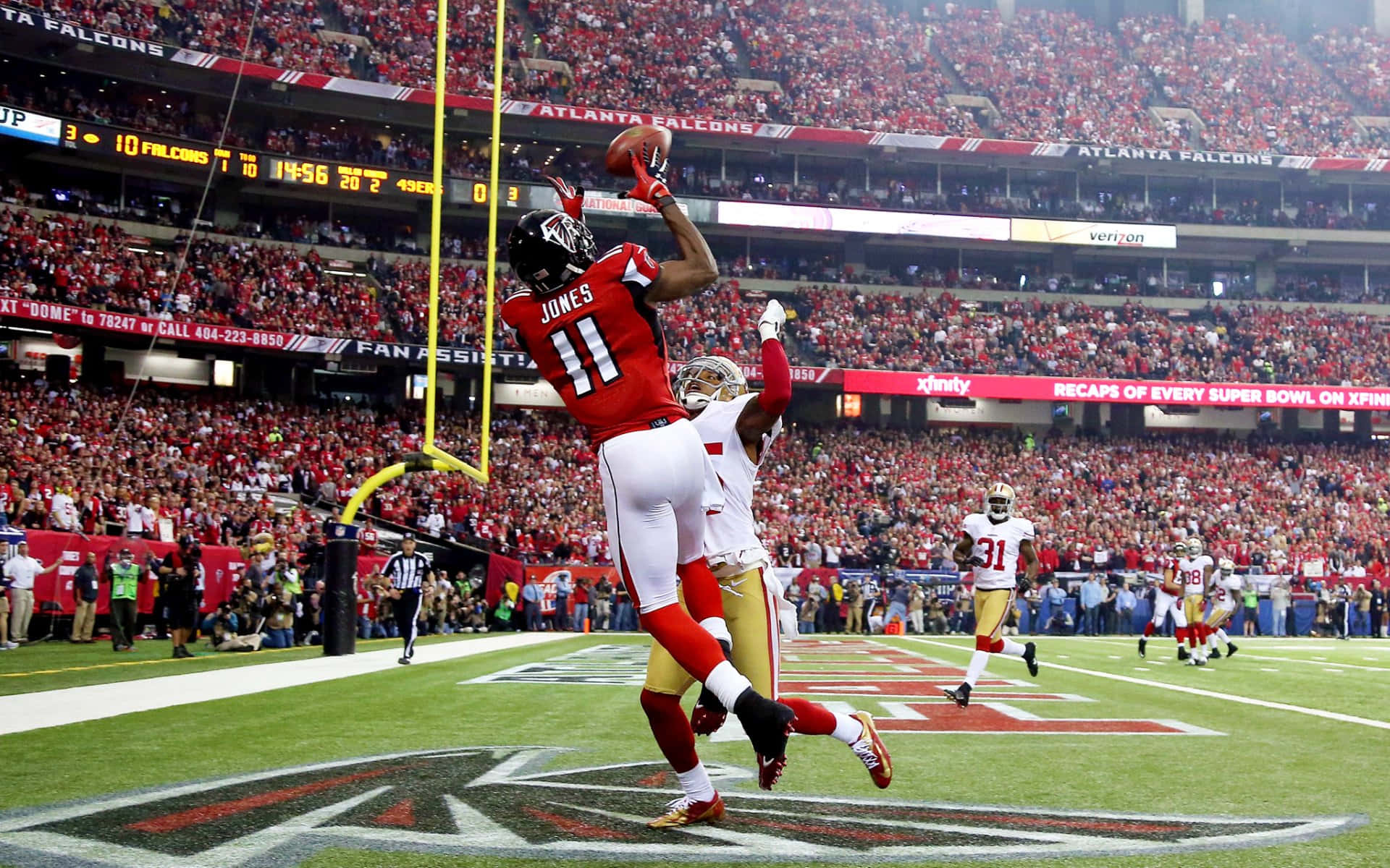 Atlanta Falcons Wide Receiver Julio Jones Catches A Touchdown Pass Against Seattle Seahawks Background