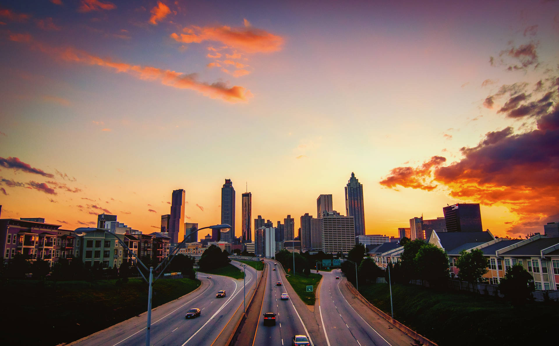 Atlanta Skyline With Sunset-bathed Sky Background