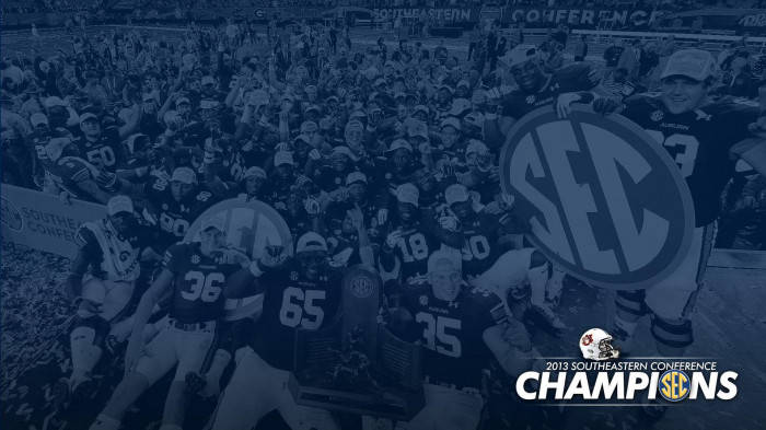 Auburn Football Team With Trophy Background