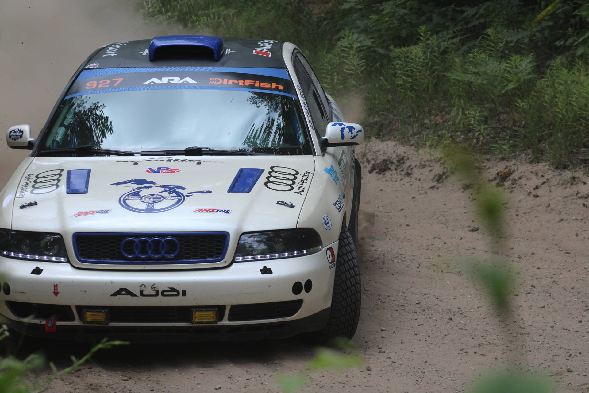 Audi A4 B5 Model Racing In Dirt Rally Background