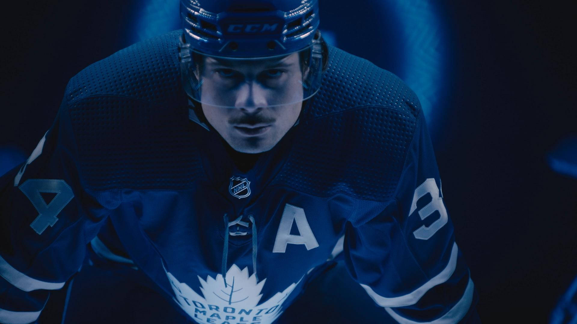 Auston Matthews Blue And Black Background