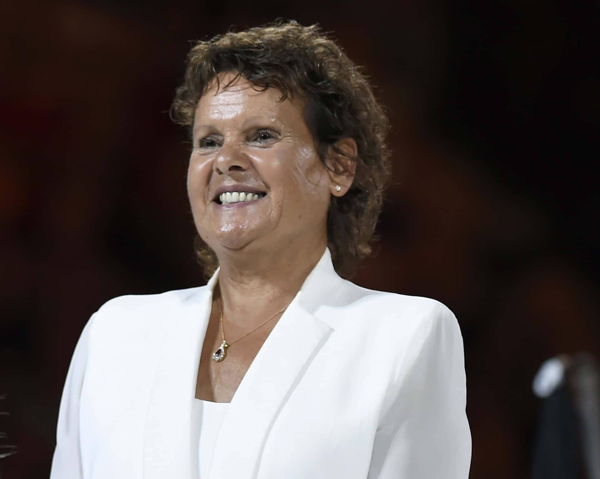 Australian Tennis Player Evonne Goolagong Cawley Smiling Background