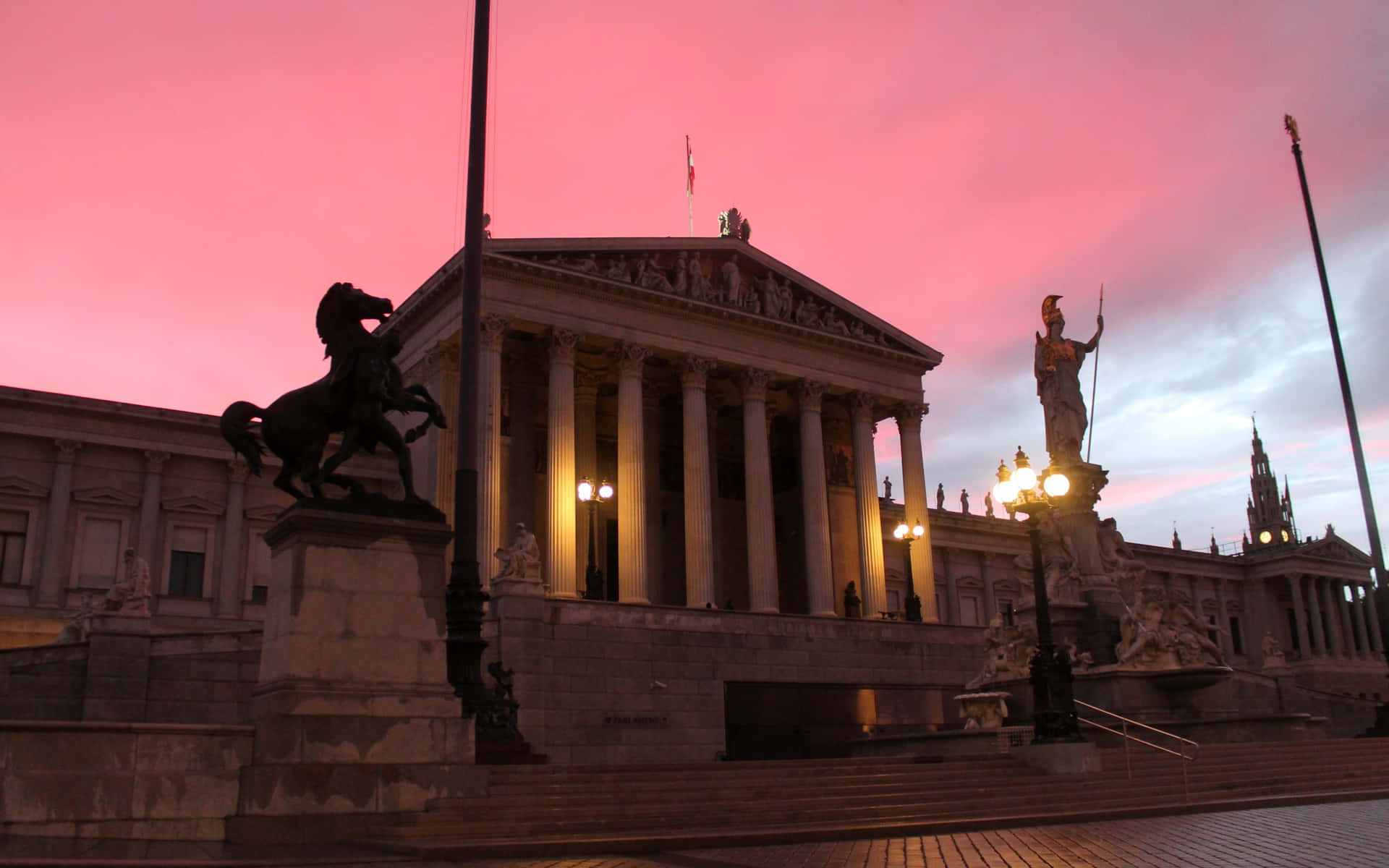 Austrian Parliament Buildings In A Beautiful Pinkish Sky Background