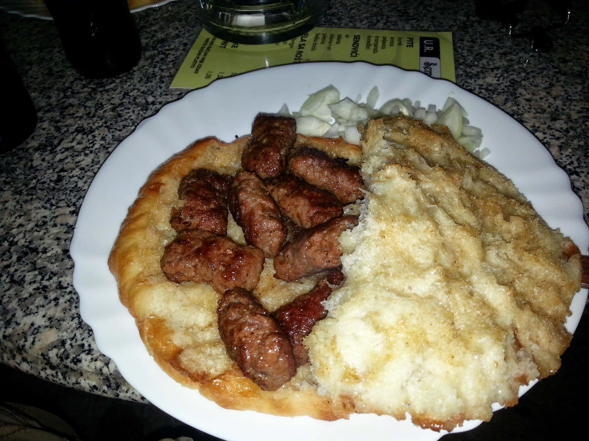 Authentic Balkan Cevapi On A Grill Background