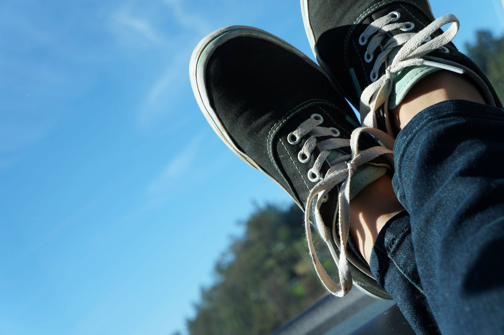 Authentic Black Vans Skate Shoes Background