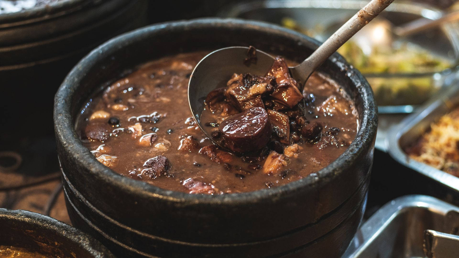 Authentic Brazilian Feijoada With Crispy Farofa Topping Background