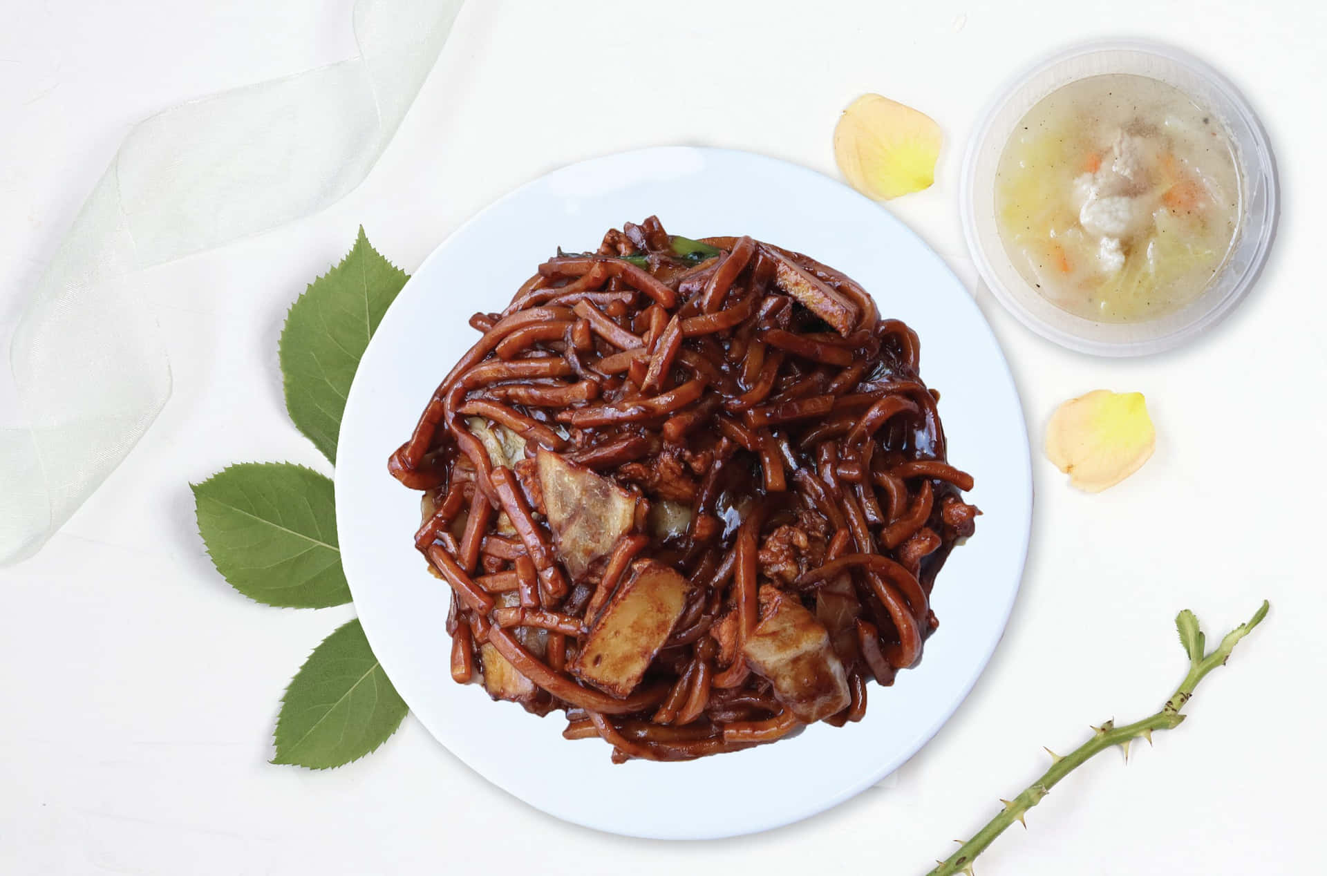 Authentic Dark Hokkien Mee On A White Plate Background