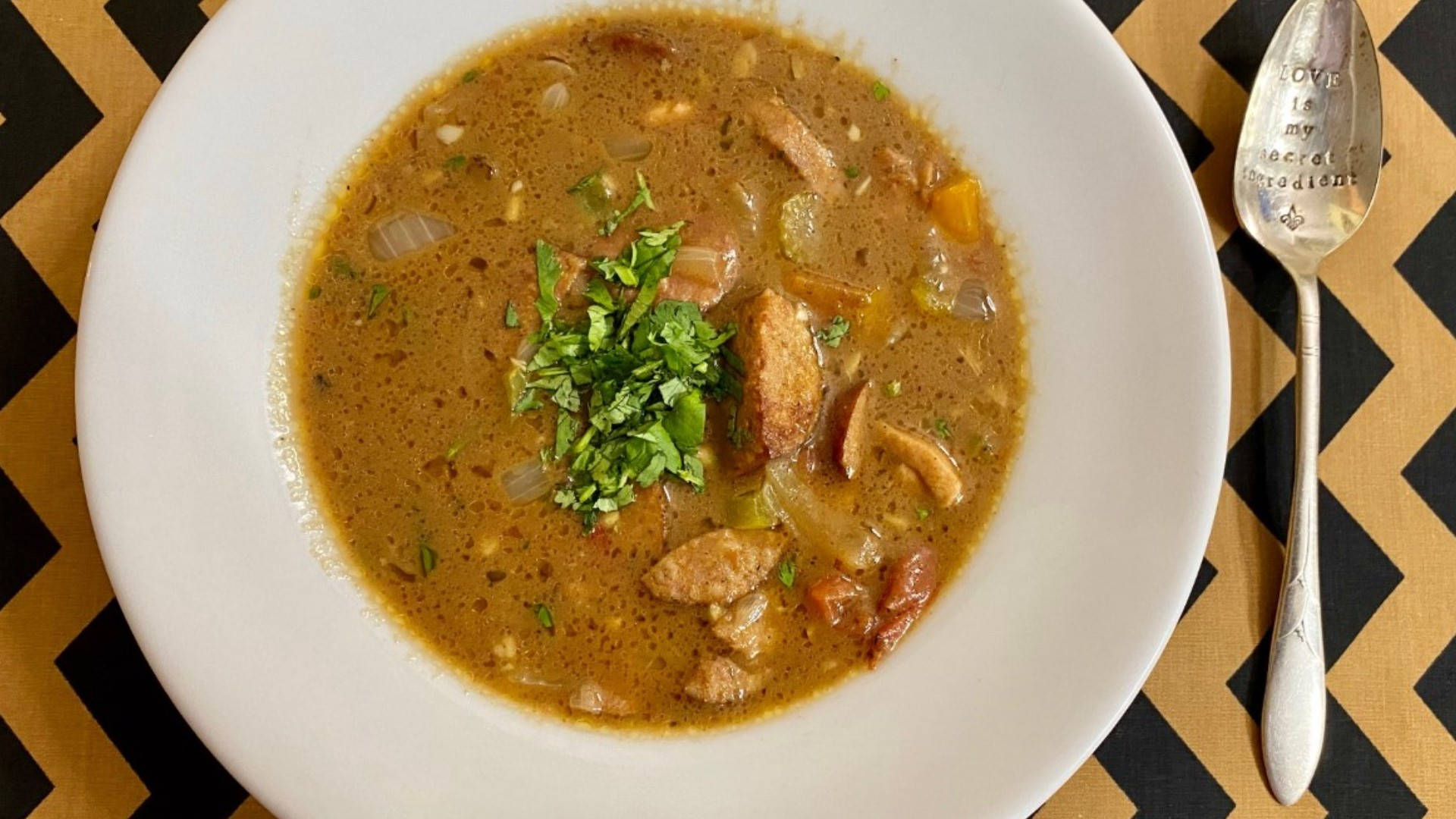 Authentic Gumbo Dish With Spoon Background