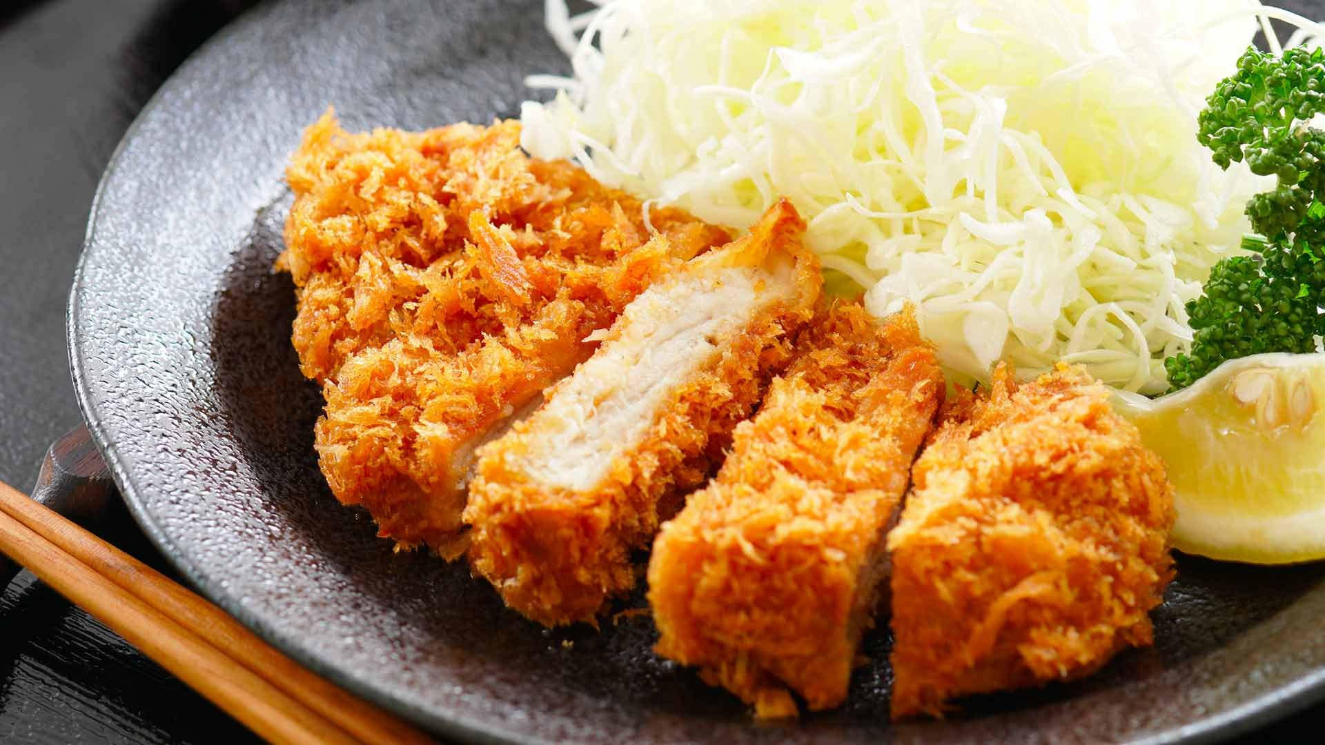 Authentic Japanese Tonkatsu - Deep Fried Pork Cutlet With Shredded Cabbage Background