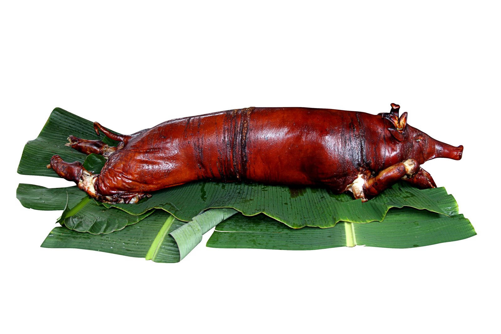 Authentic Lechon Roast On Banana Leaves Background