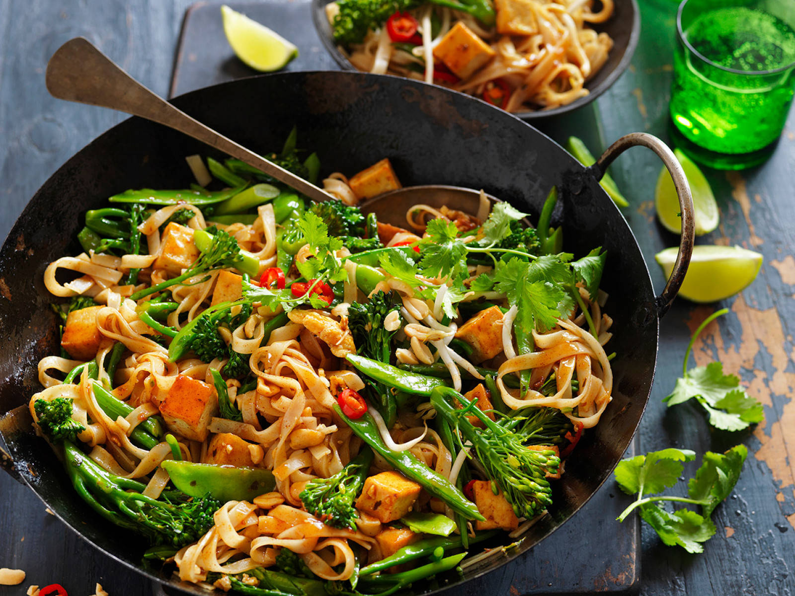 Authentic Pad Thai Noodles Tossed With Fresh Greens Background