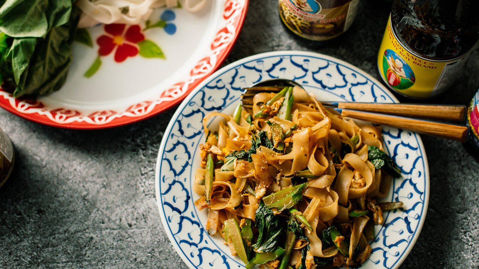 Authentic Pad Thai With Delectable Flat Noodles Background